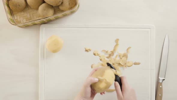 Step by step. Peeling Yukon gold potatoes for classic mashed potatoes alt