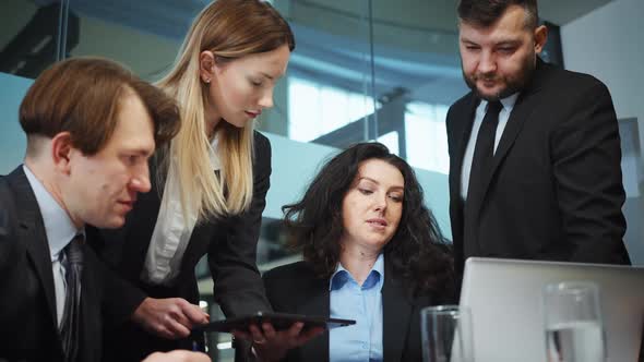 Business Team Having Meeting Discussing Company Progress alt
