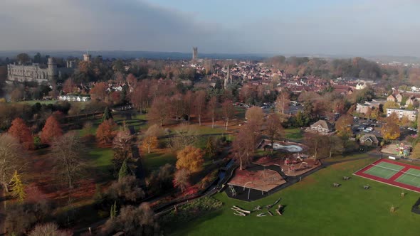 1 B Warwick Town Aerial Drone View Park River Churches Castle Autumn Cloudy Panning Left