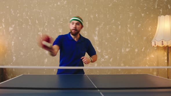 Handsome Man Playing the Ping Pong He Concentrated alt