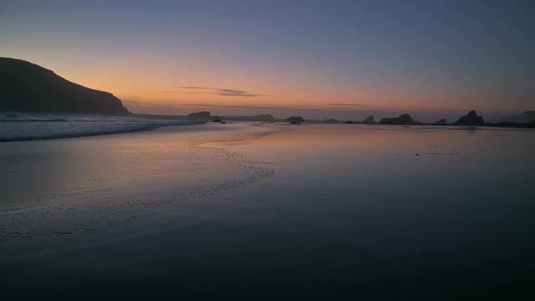 Brookings, Oregon. Beach at sunset. alt