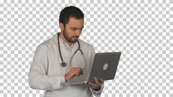 Medical doctor working with laptop, Alpha Channel