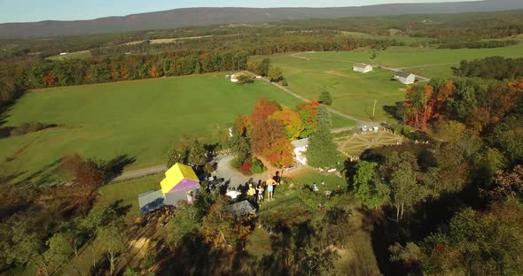 Orbiting camera showing aerial views of an eccentric’s collection of giant American roadside attract alt