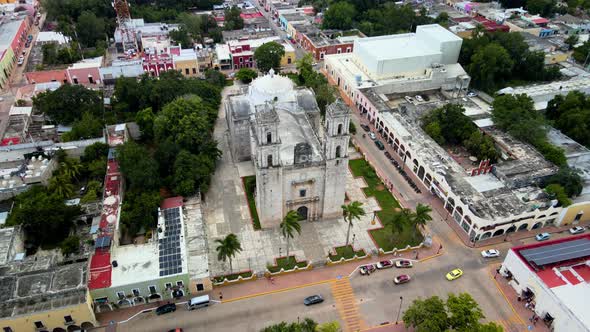 Aerial tilt down of main church in Valladolid Mexico alt
