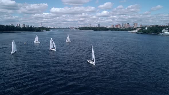 Aerial View of Yachts Race on the River
