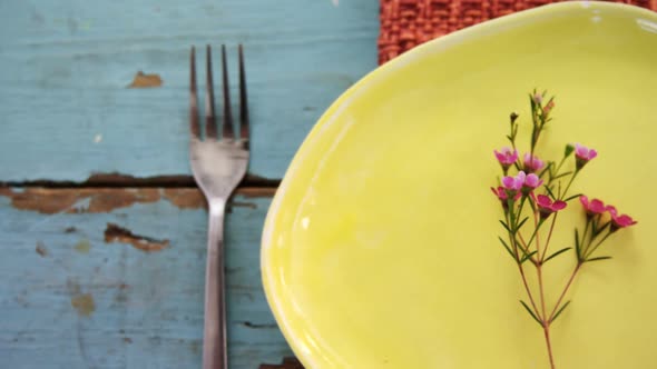 Various cutlery on wooden table 4k alt