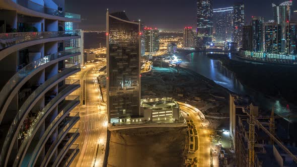 Buildings on Al Reem Island in Abu Dhabi Night Timelapse From Above alt