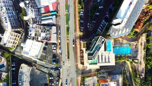 Aerial city view with roads, houses, buildings, and parking lots. Limassol, Cyprus alt