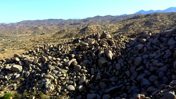 Drone shot of the rocky desert in California just east of Los Angeles. alt