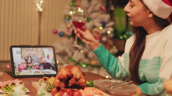 Group of Friends Enjoying Christmas Drinks  at home.