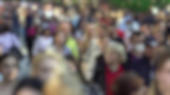 Silhouettes of People Walking in a Crowd Slow Motion alt