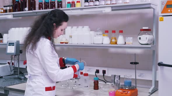 Woman Scientist Working in a Laboratory