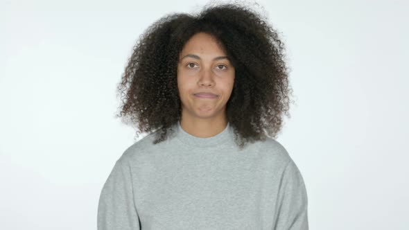 African Woman with Thumbs Down, White Background  alt