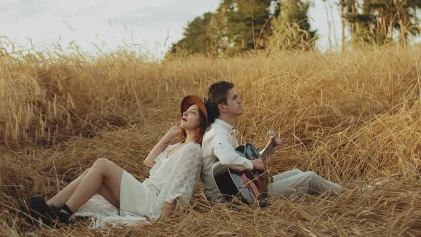 Attractive Couple in the Field of Spikelets Slow Motion alt