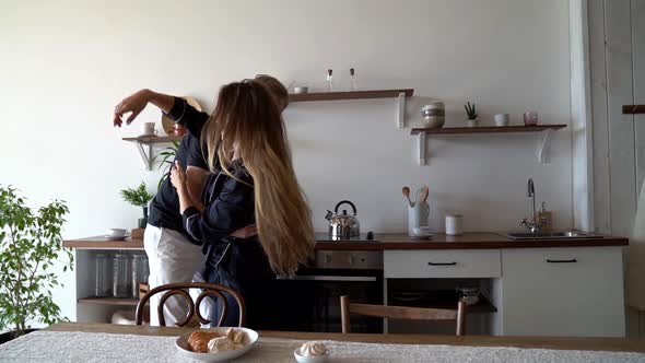 Morning at the Kitchen Table, Quick Breakfast - Croissants, Marshmallows. Bearded Husband and Young alt