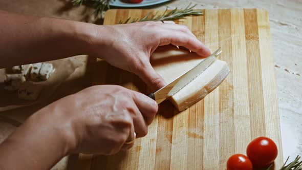 Gnocci with Tomato Sauce Being Sprinkled with Parmesan alt