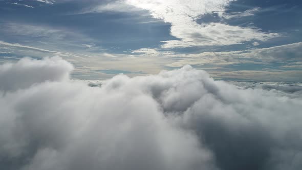 Fog morning at downtown district. Above the clouds. alt