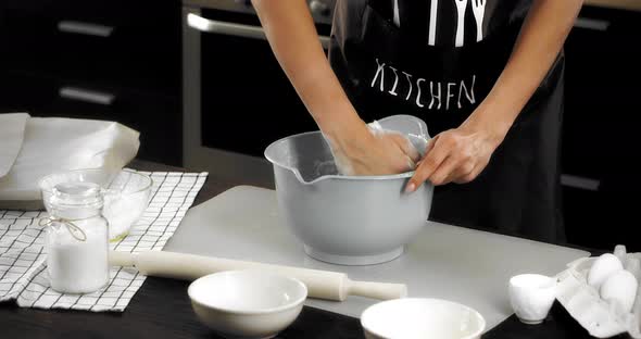 Woman Kneads Dough with Her Hands to Bake Shortbread Cookies