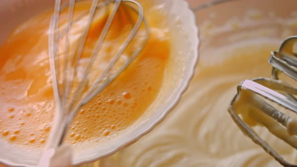 Add the Mixed Egg to the Cheesekake Ingredients alt