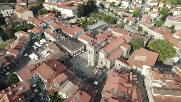 Oliveira portuguese collegiate church in Guimaraes, aerial orbital drone shot
