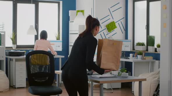 Executive Manager Holding Takeaway Food Bag Order During Takeout Lunchtime in Startup Business alt
