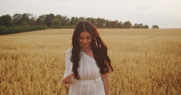 Young Pretty Girl In A White Dress