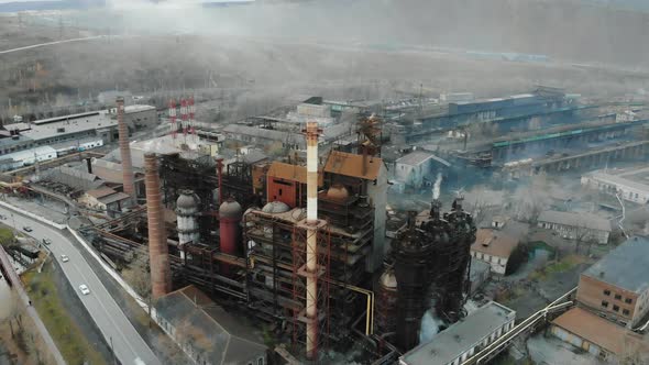 Aerial View of Industrial Factory in Smoke