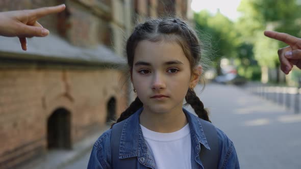 Close Up of Abusing Little Girl Getting Bullied Outside Near the School alt
