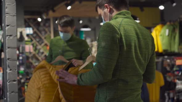 Topic of Buying Sportswear in Offline Sports Store During New Norms Pandemic for Covid 19 alt