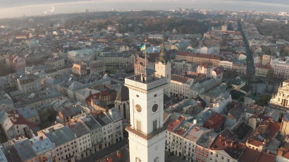 Flight Above the Roofs on Sunrise. Old European City. Ukraine Lviv City
