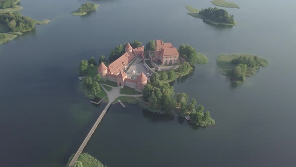 Aerial view of Medieval Trakai castle on island in lake Galve early summer morning Lithuania landmar