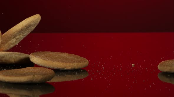 Cookies falling and bouncing in ultra slow motion  alt