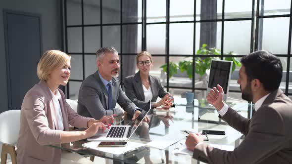 Business People Shaking Hands Finishing Up a Meeting