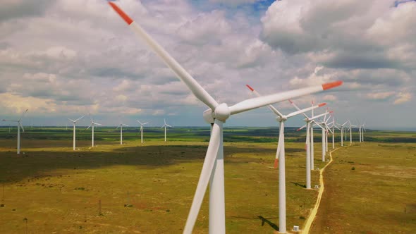 Aerial Drone Shot Windmills For Electric Power. Energy Production with clean and Renewable Energy