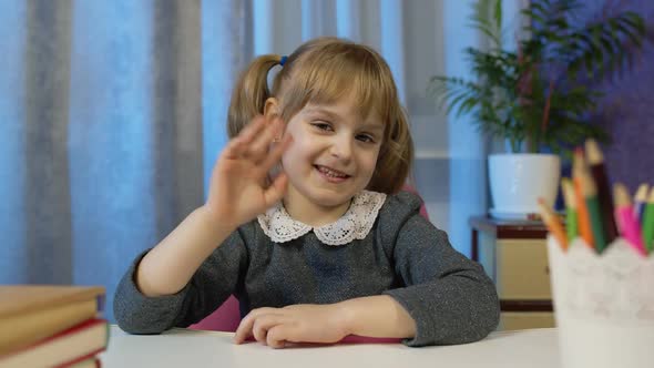 Child Girl Looking at Web Camera Making Video Call Learning Studying at Home Distance Education alt