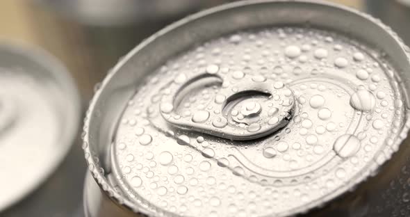 Water droplets on aluminum can of soda or beer alt