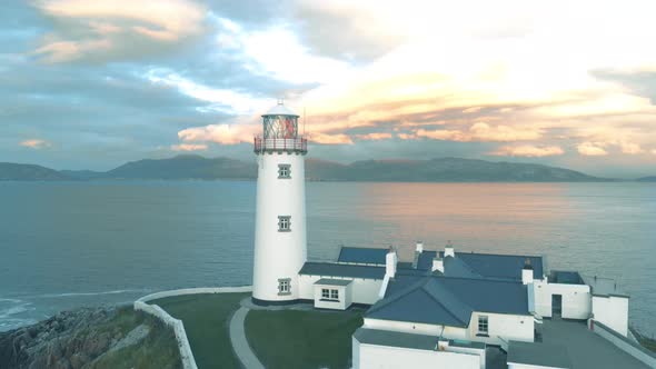 Fanad Head in Donegal Ireland lighthouse with beautiful sky at sunset alt