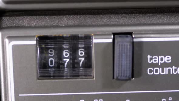 Counter of the Audio Cassette in the Tape Deck Recorder Is Rotating alt