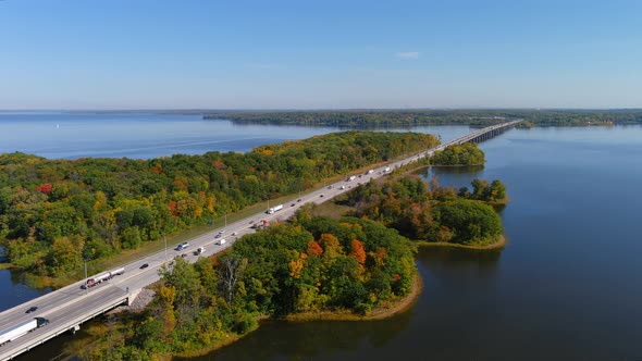 4K camera aerial drone view of Transcanada highway and fall season foliage colors in Montreal.