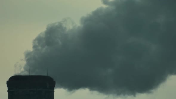 Smoke Comes From the Chimney. Air Pollution. Slow Motion. Ecology. Kyiv. Ukraine alt