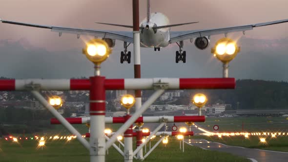 Commercial Airplane Airliner Landing at Airport Terminal alt