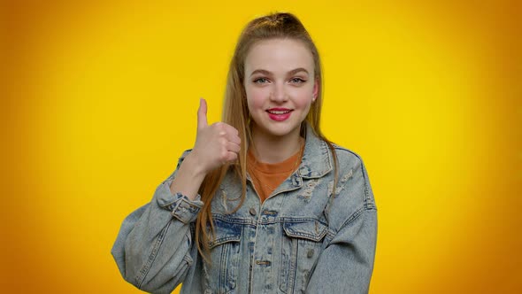 Teenager Girl Raises Thumbs Up Agrees or Gives Positive Reply Recommends Advertisement Likes Good alt