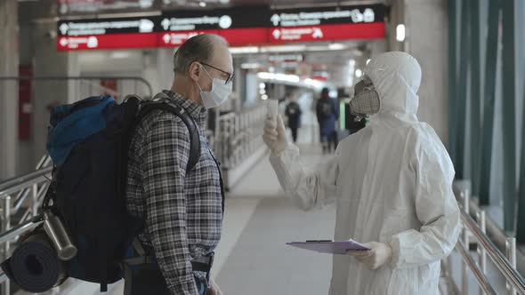 Screening of Passengers, Travellers for Chinese Coronavirus Symptoms. Temperature Checkpoints alt