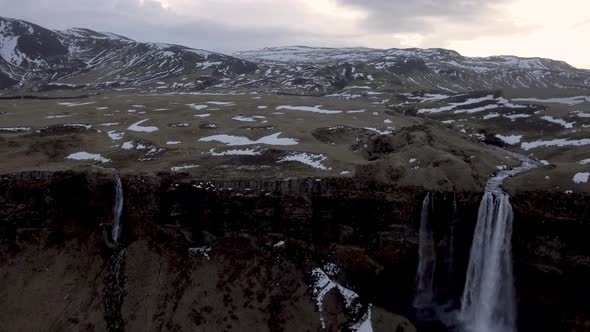 Seljalandsfoss waterfall in Iceland aerial panoramic view at sunrise
