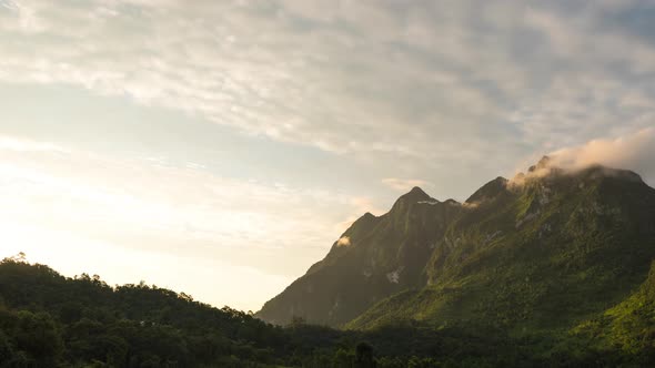 Beautiful dawn to day time lapse scenery of tropical mountain range in southeast Asia