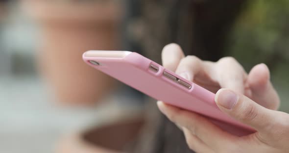 Woman use of smart phone at outdoor alt