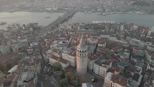 Aerial view of Galata Tower at Sunrise. Galata Tower and Golden Horn in the morning.