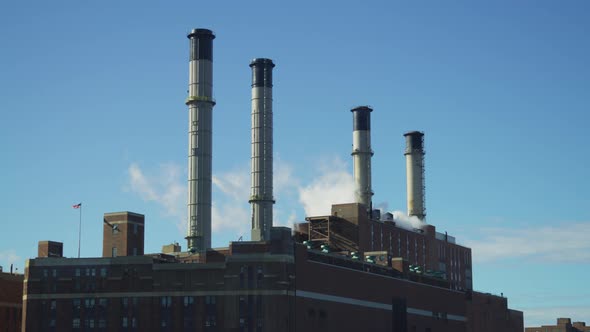 Factory with four funnels alt