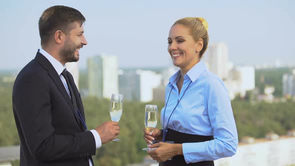 Male and Female Employees Drinking Wine Talking Office Terrace, Business Event