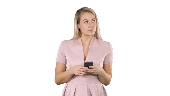 Portrait of smiling young lady reading text message on alt